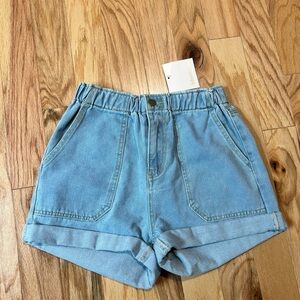 NWT Showpo light wash denim elastic waist high rise cuffed shorts size 10